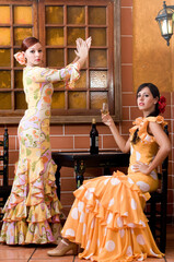 flamenco dancers at the Seville fair in April in Spain - obrazy, fototapety, plakaty