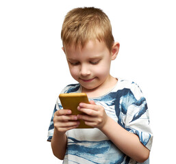 A young boy looks into a cell phone. Isolated on white.