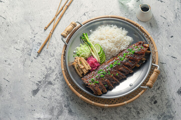 Asian style pork short ribs with rice and vegetables - 404335900
