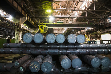 Metal structures and buildings of the old metallurgical plant inside and outside. The process of melting metal. Products of the metallurgical enterprise.