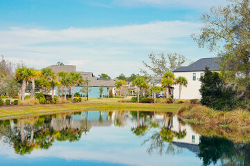 Florida house and pond reflection