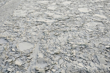 The texture of the ice and snow.A frozen river at sunset.
