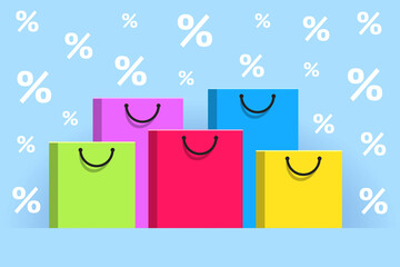 Colored paper shopping bags and white percent signs