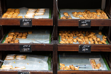 Counters of a small bakery shop filled with tasty fresh buns in Haifa, Israel