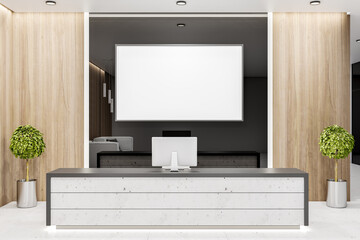 Bright office hall with blank billboard on wall.