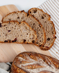 Fresh loaves of bread on a white table