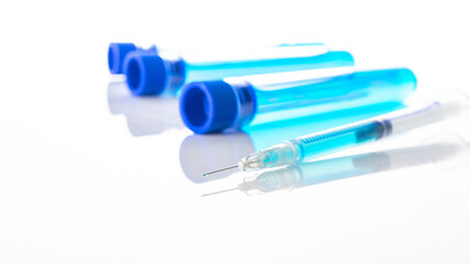 Protection covid. Medical syringe with needle for protection flu virus and coronavirus. Covid vaccine isolated on white. Concept: diseases, medical care, science.