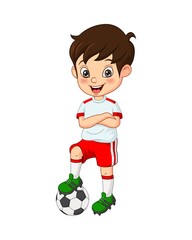 Little boy dressed in a soccer uniform with soccer ball
