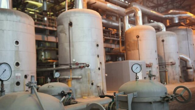 Manometer pipes and valve in boiler room. Thermal power plant piping at modern factory. Sugar beet production plant
