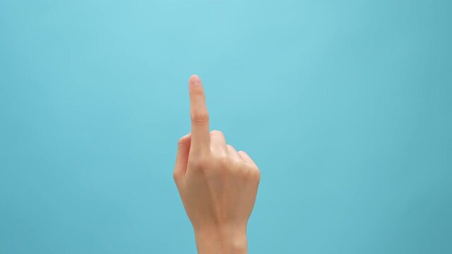 Hand touching and clicking on the blue background, Simulate touch screen phone and tablet.