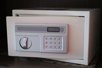 Small white digital safe for home or office. Selected focus.