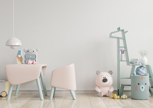 Mock up wall in the children's room with pink sofa in light white color wall background.