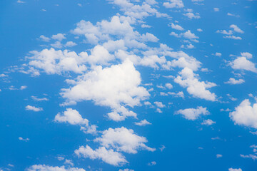 Fototapeta na wymiar Capturing the fluffy white clouds and the blue sky