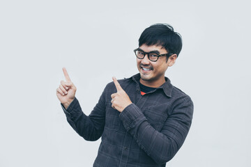 adult asian man.young male person wear eye glasses.posing smiling laughing look excited surprised thinking positive happy.empty,copy space for text advertising.white background.attractive fashion