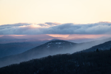 View of Fog Rolling over Mountains from Rough Ridge on the Blue Ridge Parkway at Sunset