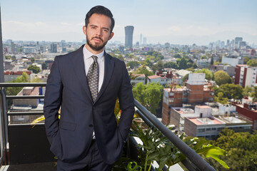 Portrait Young Business man standing in concept successful on cityscape background