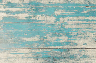 Fototapeta na wymiar Weathered blue painted wooden wall. Vintage blue wood plank background. Old blue wooden wall coming from beach.