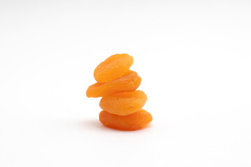 Stack of Dried apricots fruits isolated on a white background