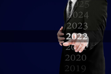 Business new year card 2022 concept: Businessman welcome year 2022