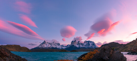 Torres del Paine over the Pehoe lake, Patagonia, Chile. Torres del Paine National Park seen at dawn.