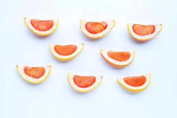 High vitamin C. Juicy grapefruit slices on white.