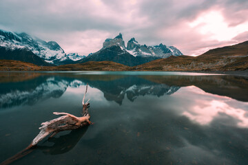 Majestic mountain landscape. Reflection of mountains in the lake. National Park Torres del Paine, the most popular tourist destination in Chile, South America. - obrazy, fototapety, plakaty