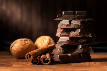 still life with chocolate cinnamon and walnuts