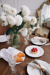 Table setting for tea with desserts. Waiting for guests concept.