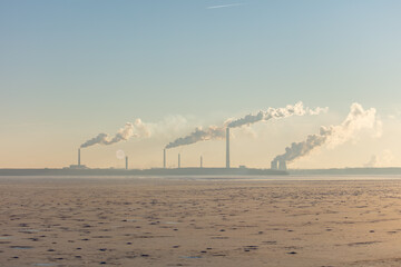 Smoke from chimneys of a metallurgical plant.