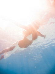 Fototapeta premium Woman underwater at the pool