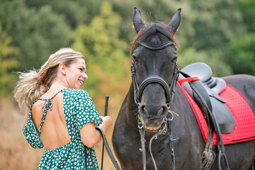 Obraz premium riding girl and horse