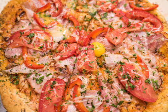Delicious and juicy pizza carbonara close-up. Unhealthy and tasty food