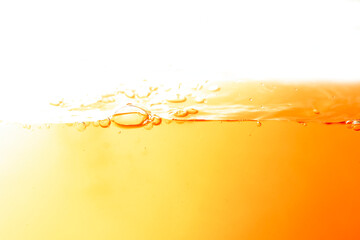 The image of moving water in orange waves	