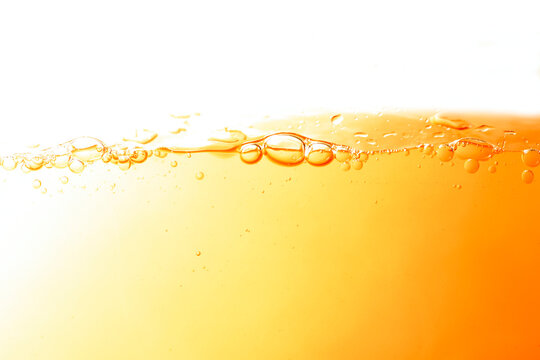 The image of moving water in orange waves	
