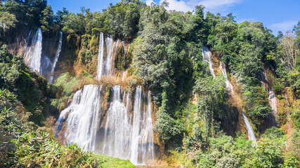 Fototapeta premium Aerial view of Thi Lo Su Waterfall in the morning It is one of the sixth most beautiful waterfalls in the world. The height of the waterfall is 300 meters and 500 meters wide.Nobody.