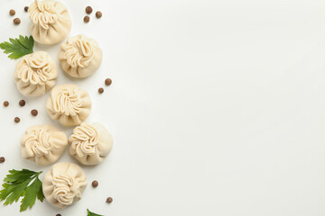 Obraz premium Raw khinkali, pepper and parsley on white background