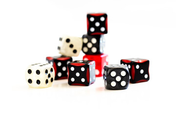 Selection of multi coloured dice on white background