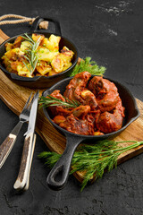 Lamb tongue baked in oven in cast iron skillet