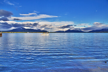 Fototapeta na wymiar The boat in Pacific ocean, Puerto Natales, Chile