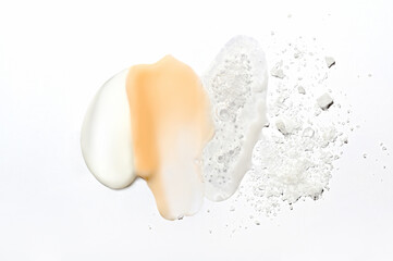 Mix of textures of cream, lotion, liquid gel and sea salt on a white background close-up. Mixed...