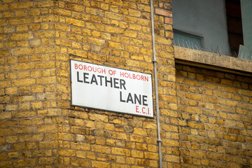 Fototapeta na wymiar London- January, 2021: Leather Lane street sign in the borough of Holborn, a market street of Hatton Garden. 