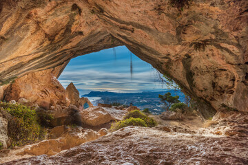 Long exposure of Benidorm city from inside the cave
