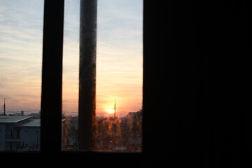 sunset over the city with orange sky beautiful view