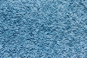 Fototapeta na wymiar Blue towel texture. Macro fiber pattern. Soft cotton textile material background. Absorbent fluffy cloth.
