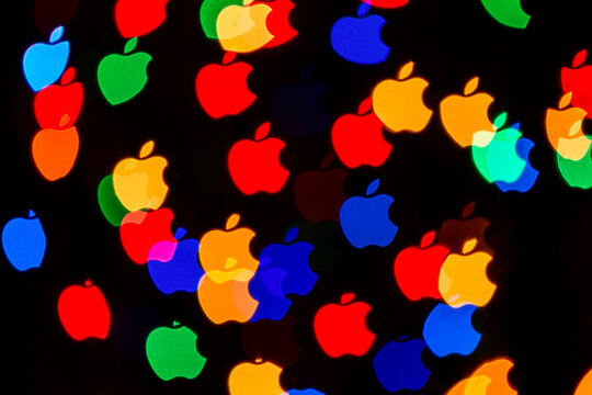 Moscow, Russia - January, 2021: Logo of Apple company colorful abstract background. Apple Inc. is an American multinational technology company headquartered in Cupertino, California
