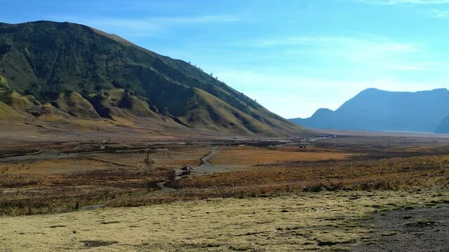 Concept N3 Wide View of Savanna With Montainous View at Mount Bromo