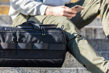 Man with stylish bag on street