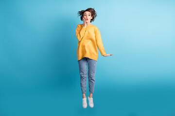 Full length body photo of amazed girl with short hairstyle touching cheekbones isolated on vibrant blue color background