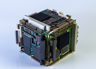 cube from PC/104 form factor electronics boards on white background with reflection