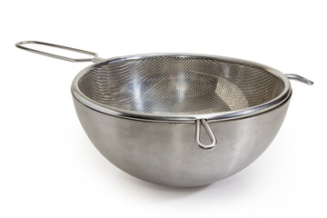 Round stainless steel sieve in steel bowl, side view closeup